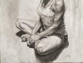 self portrait, woman sitting cross legged, looking up