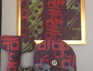 Unique Batik design fabric, pillows and wall plaques.